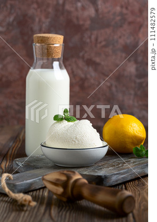 Homemade ricotta cheese. Homemade ricotta cheese. 111482579