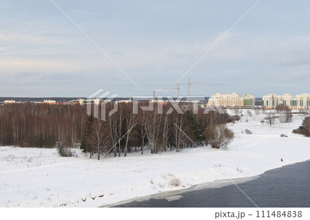 river on a sunny evening. Trees and shrubs. Landscape of winter nature, river banks river on a sunny evening. Trees and shrubs. Landscape of winter nature, river banks 111484838
