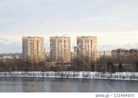 river on a sunny evening. Trees and shrubs. Landscape of winter nature, river banks  111484855