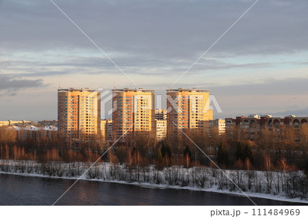 river on a sunny evening. Trees and shrubs. Landscape of winter nature, river banks with bushes. river on a sunny evening. Trees and shrubs. Landscape of winter nature, river banks with bushes. 111484969