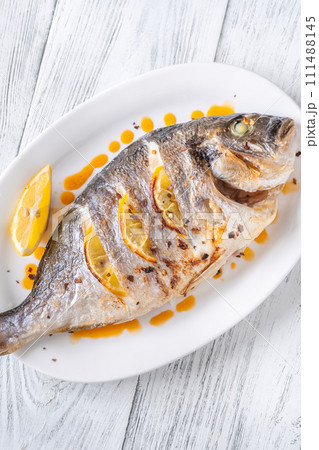Baked dorado fish 111488145