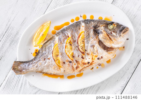 Baked dorado fish 111488146