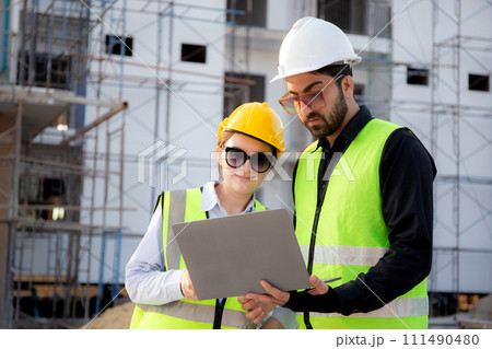 Team of architect or engineer looking laptop for inspection and planning construction. Team of architect or engineer looking laptop for inspection and planning construction. 111490480