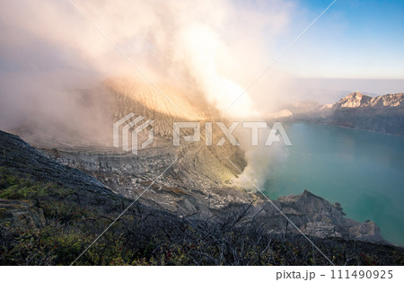 Beautiful landscape of Kawah Ijen volcano in East Java of Indonesia at dawn. One of the most dangerous tourist destination in the world. 111490925