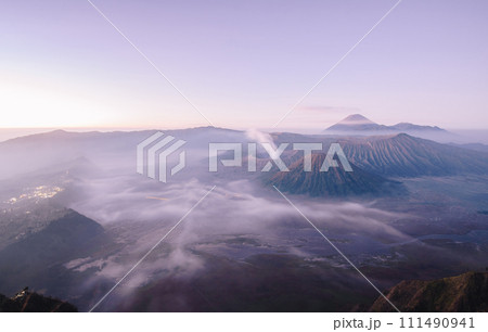 Wide angle view of Mount Bromo in the early morning. This is an active volcano part of the Tengger massif, in East Java, Indonesia. 111490941