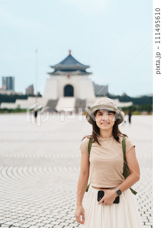 woman traveler visiting in Taiwan, Tourist with hat sightseeing in National Chiang Kai shek Memorial or Hall Freedom Square, Taipei City. landmark and popular attractions. Asia Travel concept woman traveler visiting in Taiwan, Tourist with hat sightseeing in National Chiang Kai shek Memorial or Hall Freedom Square, Taipei City. landmark and popular attractions. Asia Travel concept 111495610