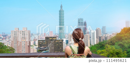 woman traveler visiting in Taiwan, Tourist looking Taipei City during sightseeing and hiking at Elephant Mountain or Xiangshan, landmark and popular attractions. Asia Travel, vacation and Trip concept woman traveler visiting in Taiwan, Tourist looking Taipei City during sightseeing and hiking at Elephant Mountain or Xiangshan, landmark and popular attractions. Asia Travel, vacation and Trip concept 111495621