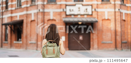 woman traveler visiting in Taiwan, Tourist sightseeing at Red House or old theater in Ximen, Taipei City. landmark and popular attractions. Asia Travel, Trip and Vacation concept woman traveler visiting in Taiwan, Tourist sightseeing at Red House or old theater in Ximen, Taipei City. landmark and popular attractions. Asia Travel, Trip and Vacation concept 111495647