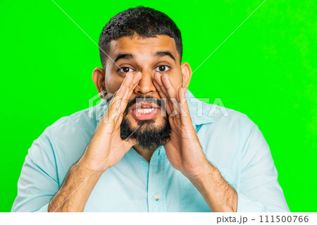 Young man whisper news rumors holding hands near mouth, share gossip, quiet, keep my secrets 111500766