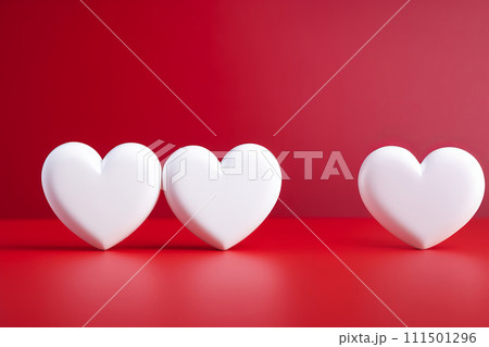 Three white hearts, placed on a red background. Valentine's Day greeting card. 111501296