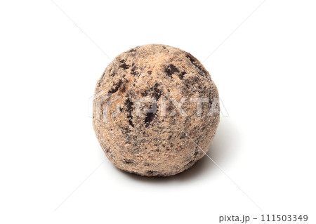 Chocolate truffle candy close-up on a white background Chocolate truffle candy close-up on a white background 111503349