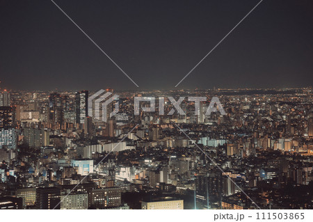 Nov 28 2023 bustling urban metropolis with illuminated buildings. 111503865