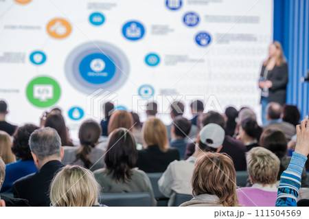 Female speaker presenting at professional conference to audience 111504569