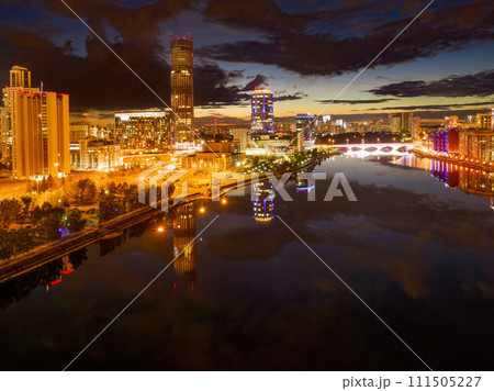 Yekaterinburg city and pond aerial panoramic view at summer or early autumn night. Night city in the early autumn or summer. 111505227