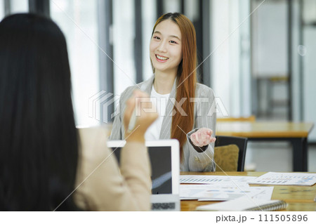 Businesswoman having a job interview with a candidate in the position of secretary to help with business and as a consultant. Businesswoman having a job interview with a candidate in the position of secretary to help with business and as a consultant. 111505896