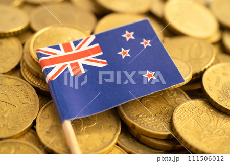 New Zealand flag on coins money, finance and accounting, banking. 111506012