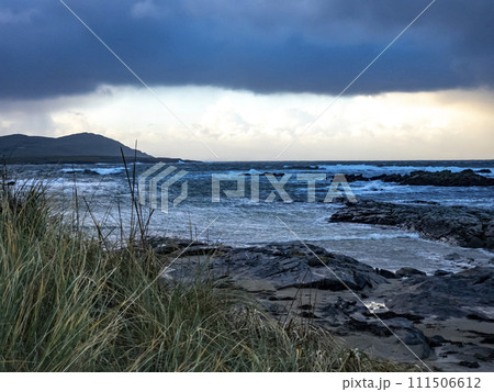 Dramatic clouds at Carrickfad by Portnoo at Narin Strand in County Donegal Ireland Dramatic clouds at Carrickfad by Portnoo at Narin Strand in County Donegal Ireland 111506612