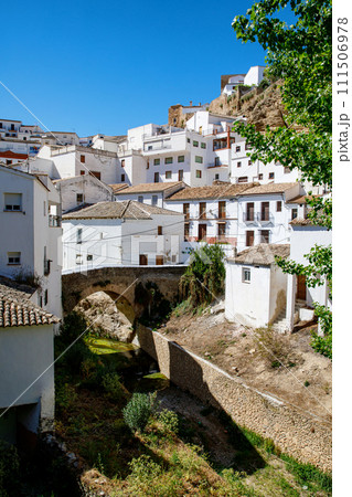 The beautiful village of Setenil de las Bodegas on a sunny summer day. Provice of Cadiz, Andalusia, Spain The beautiful village of Setenil de las Bodegas on a sunny summer day. Provice of Cadiz, Andalusia, Spain 111506978