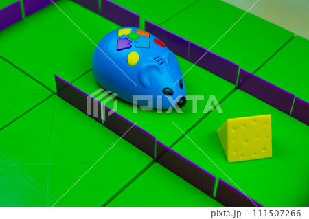 Electronic toy mouse near the cheese Electronic toy mouse near the cheese 111507266