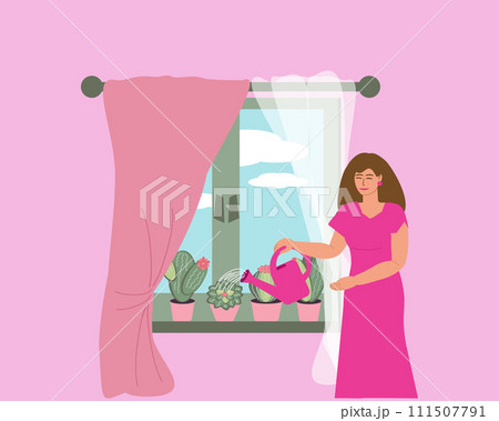 A woman waters succulent flowers on the window 111507791
