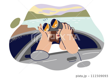 Woman traveler uses binoculars while looking out car to view beauty nature and surrounding landscape Woman traveler uses binoculars while looking out car to view beauty nature and surrounding landscape 111509093
