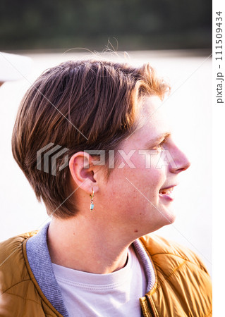 Profile Portrait of Androgynous Individual in Natural Light Profile Portrait of Androgynous Individual in Natural Light 111509434