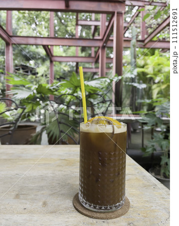 Iced americano black coffee mix of orange juice Iced americano black coffee mix of orange juice 111512691