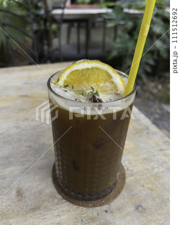 Iced americano black coffee mix of orange juice Iced americano black coffee mix of orange juice 111512692