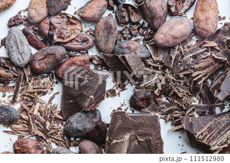 Cocoa beans with chocolate on a white background. Shalllow dof. 111512980