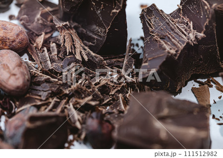 Cocoa beans with chocolate on a white background. Shalllow dof. 111512982