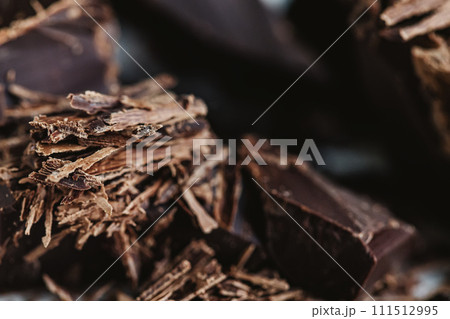 Cocoa beans with chocolate on a white background. Shalllow dof. 111512995
