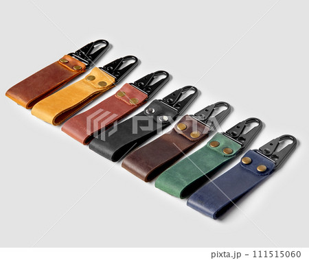 Handcrafted embossed leather keychains of various colors with carabiner clasps 111515060