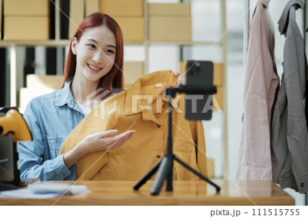 Entrepreneur Showcasing Clothes for Online Store 111515755