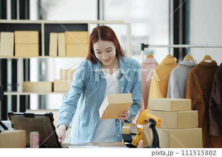 Online Shop Owner Managing Orders Online Shop Owner Managing Orders 111515802