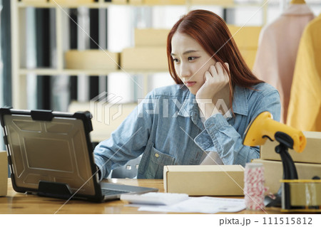 Woman seller SME retail owner feeling upset and disappointed about her recent sell record. Woman seller SME retail owner feeling upset and disappointed about her recent sell record. 111515812