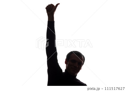 Man's hand shows symbol ok - silhouette Man's hand shows symbol ok - silhouette 111517627