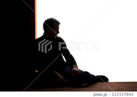 Young man with grief dropped his arms Young man with grief dropped his arms 111517642