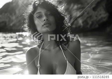 Black and white photo of beautiful girl in swimsuit, girl on the beach seaside 111518285