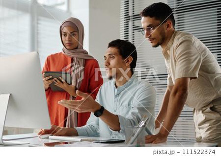 Meeting of three Muslim employees Meeting of three Muslim employees 111522374