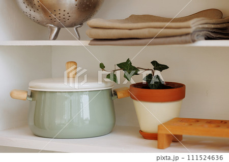 Kitchen shelf with cookware. Kitchen shelf with cookware. 111524636