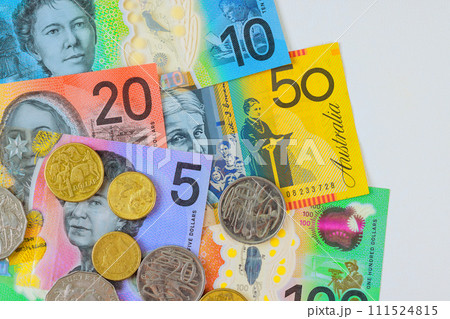 Various Australian currency AUD dollars banknotes of different denominations on white background Various Australian currency AUD dollars banknotes of different denominations on white background 111524815