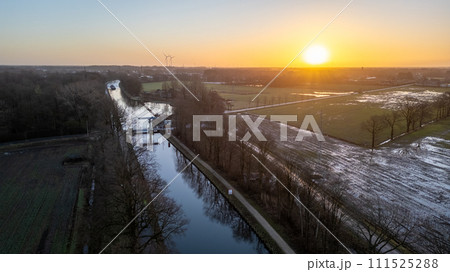 Winter Sunrise over Canal and Farmland Winter Sunrise over Canal and Farmland 111525288