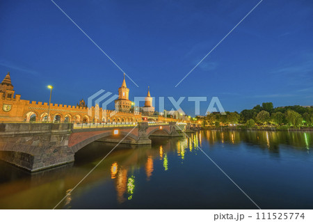 Berlin Germany, sunset city skyline at Oberbaum Bridge and Spree River 111525774