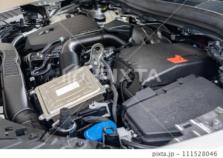 modern car engine under hood close up detail modern car engine under hood close up detail 111528046