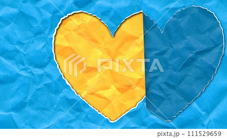 Scrap of paper in the shape of a heart in the colors of the Ukrainian flag 111529659