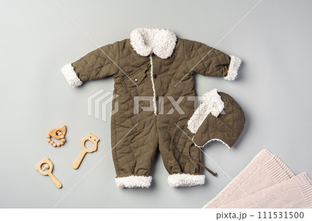 Gray quilted baby overalls for winter flat lay 111531500