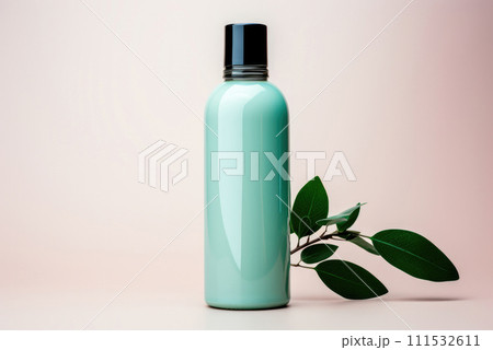 Plastic cosmetic jar with a branch of green leaves 111532611