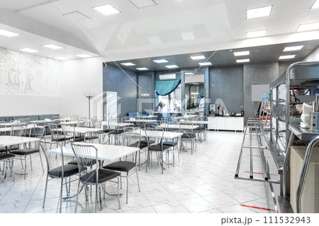 Interior of light colored canteen at the business center Interior of light colored canteen at the business center 111532943