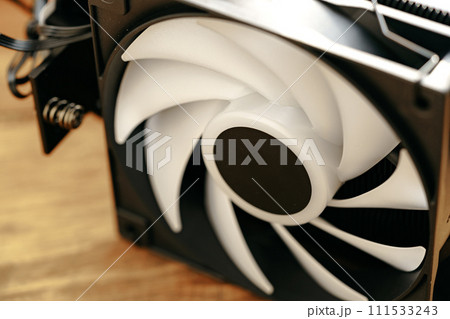 Close up of a cooler computer fan Close up of a cooler computer fan 111533243