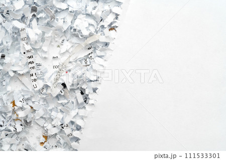 Shredded paper on white background close up 111533301